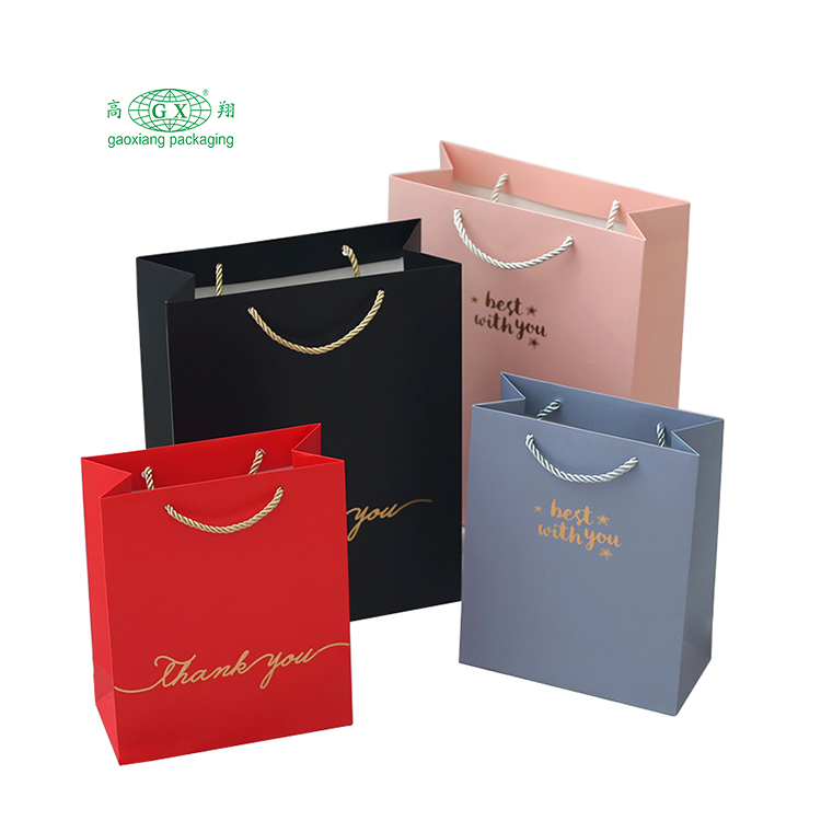 工場カスタム ロゴ bolsas de papel 高級ギフト包装袋再利用可能な紙のショッピング バッグ