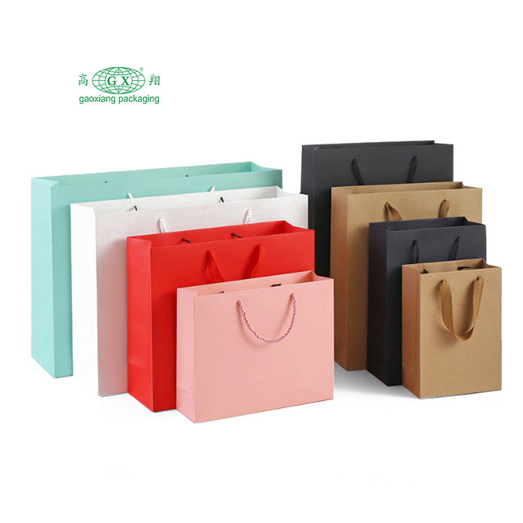 工場カスタム ロゴ bolsas de papel 高級ギフト包装袋再利用可能な紙のショッピング バッグ